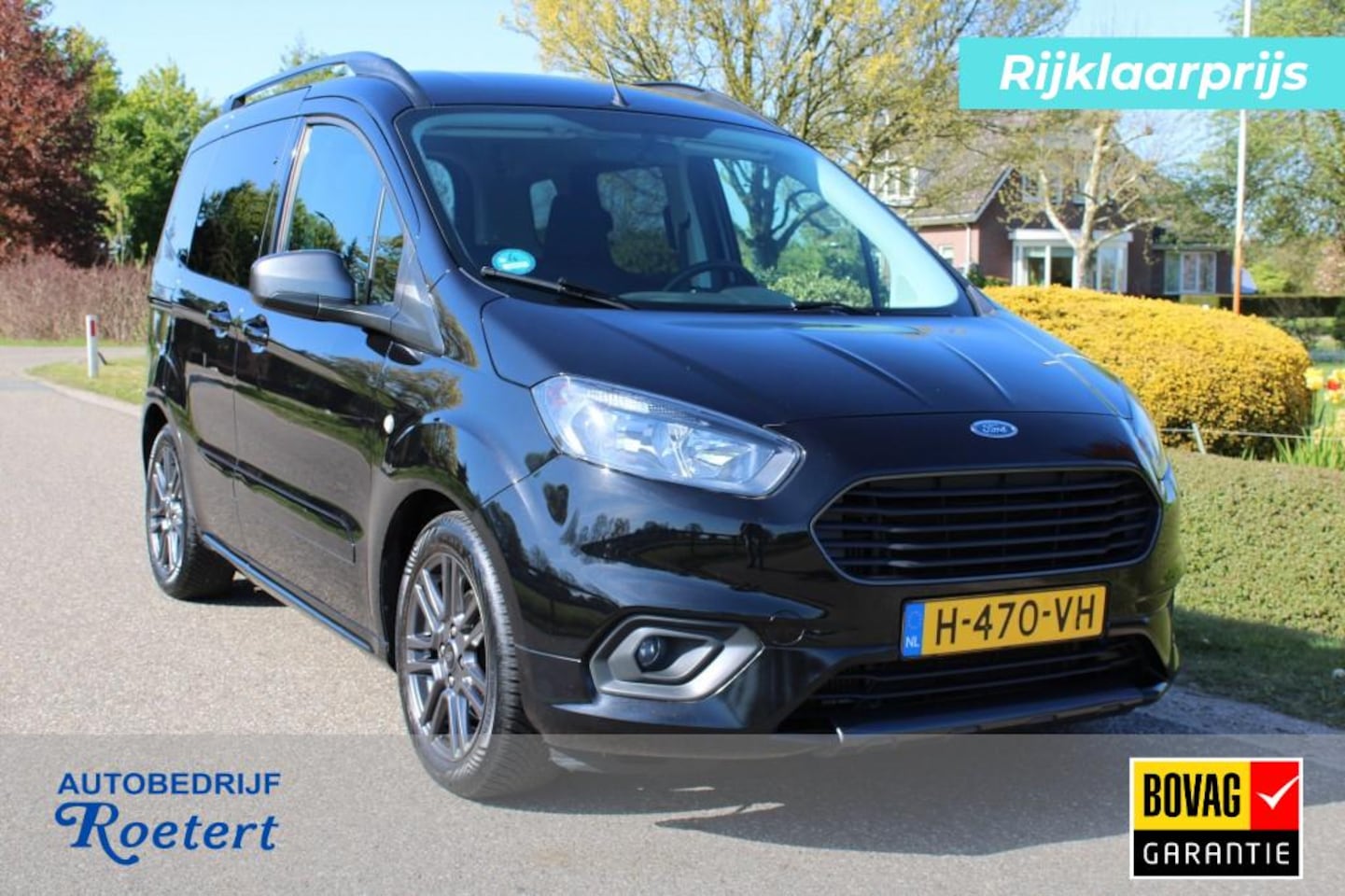 Ford Tourneo Courier - 1.0 100pk Titanium MPV Airco/Half leer/PDC 5-persoons - AutoWereld.nl