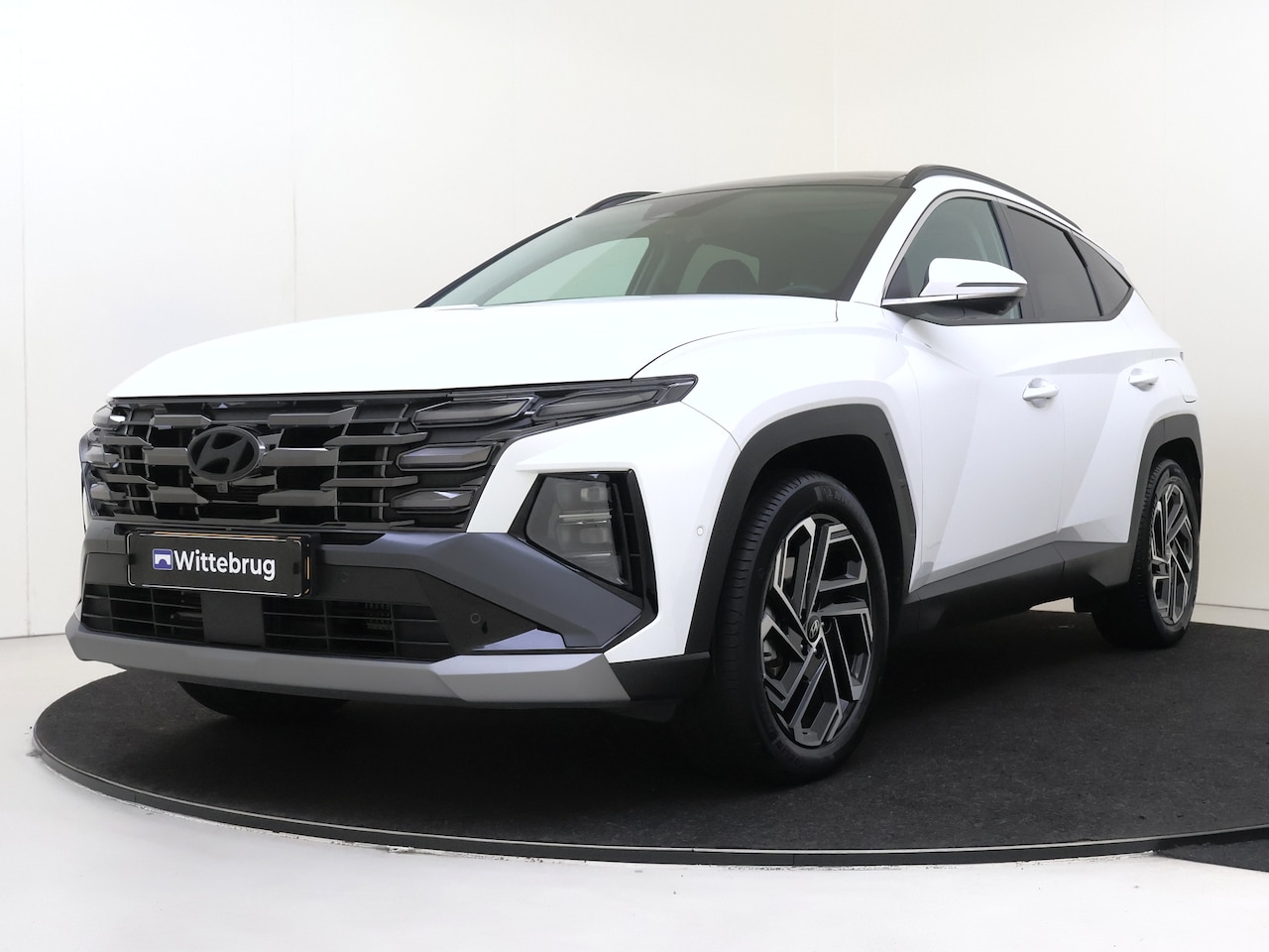 Hyundai Tucson - 1.6 T-GDI PHEV Premium Sky UITVERKOOP DEAL!! | Open dak | Lederen bekleding | RT - AutoWereld.nl