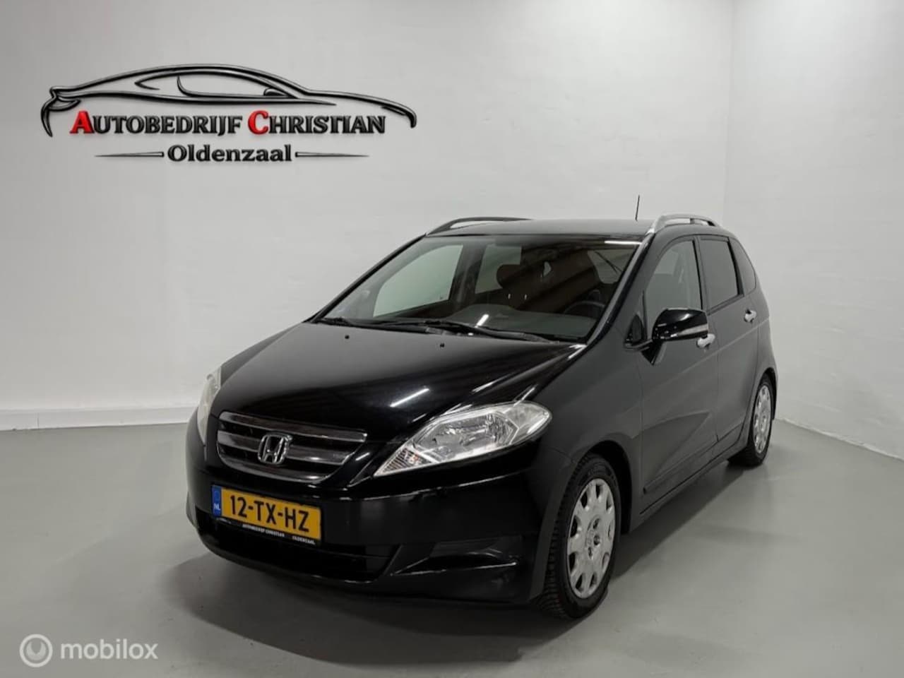 Honda FR-V - 2.0i Lifestyle | 6 PERS. | CLIMA | PARKSENS. A. - AutoWereld.nl