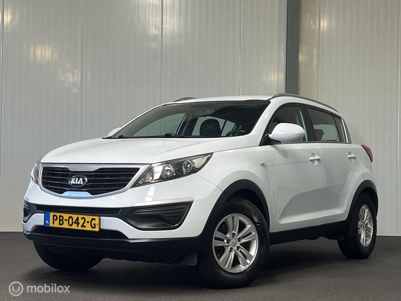 Kia Sportage - 1.6 GDI [ cruise control trekhaak airco LM ] - AutoWereld.nl
