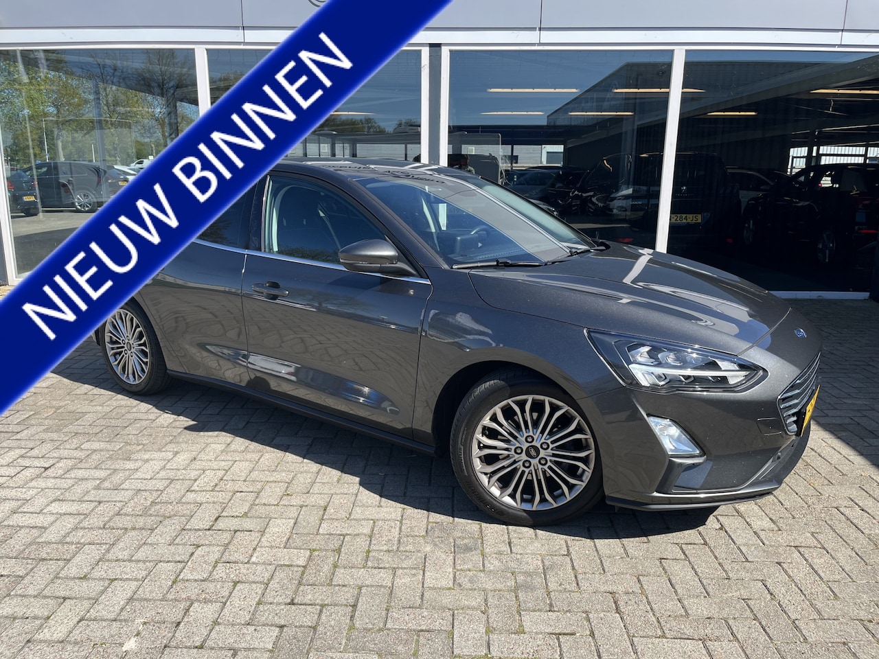 Ford Focus - 1.0 EcoBoost Titanium Business Carplay / Led / Lmv / Sportstoelen / Cruise - AutoWereld.nl