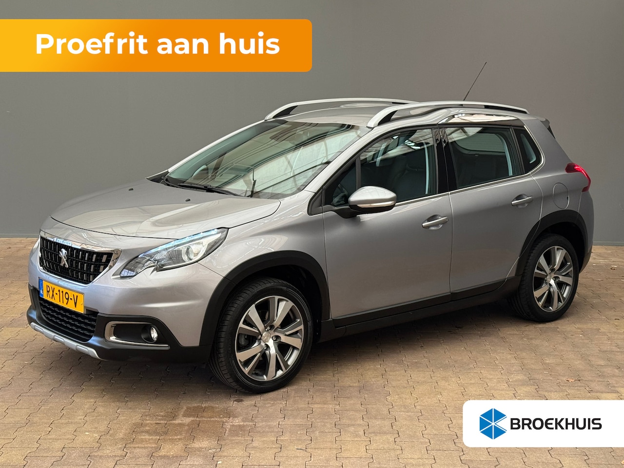 Peugeot 2008 - 1.2 PureTech Allure Volledig Lederen Bekleding | Trekhaak | Climate Control | Carplay | Cr - AutoWereld.nl