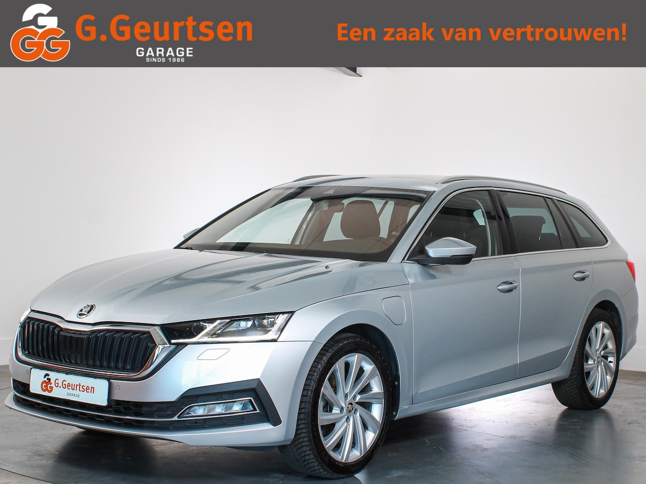 Skoda Octavia Combi - 1.4 TSI iV PHEV Business Edition Trekhaak, ACC, Camera, Stoelverwarming - AutoWereld.nl