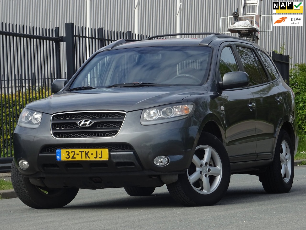 Hyundai Santa Fe - 2.7i V6 4WD Style 7P. AUT NAP/LEER/NAVI/PDC - AutoWereld.nl