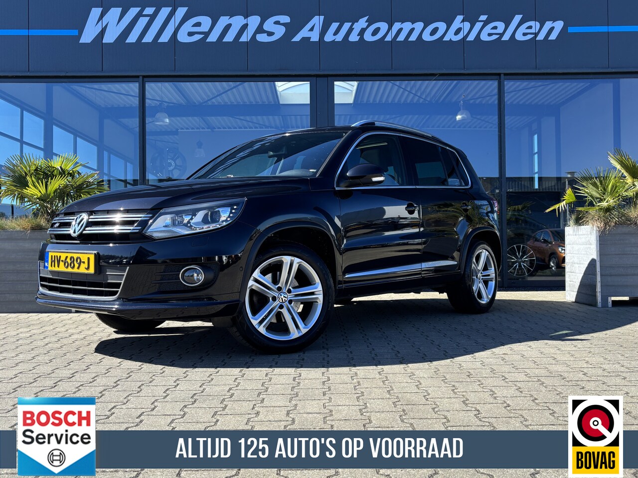 Volkswagen Tiguan - 1.4 TSI R-Line Edition Schuifkanteldak, App-Connect & Trekhaak Afneembaar - AutoWereld.nl