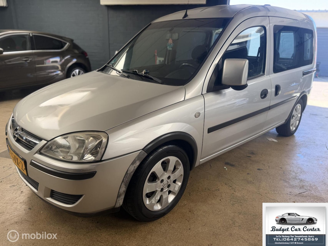 Opel Tour - 1.4-16V Essentia 5 persoons - AutoWereld.nl