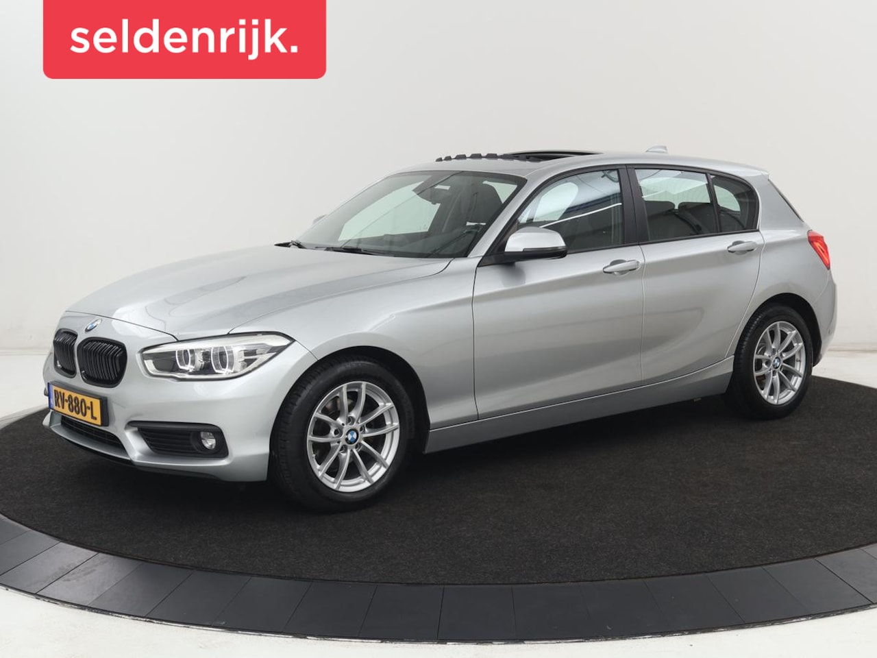 BMW 1-serie - 118i Executive | Schuifdak | Leder | Stoelverwarming | Camera | Full LED | Navigatie | Par - AutoWereld.nl