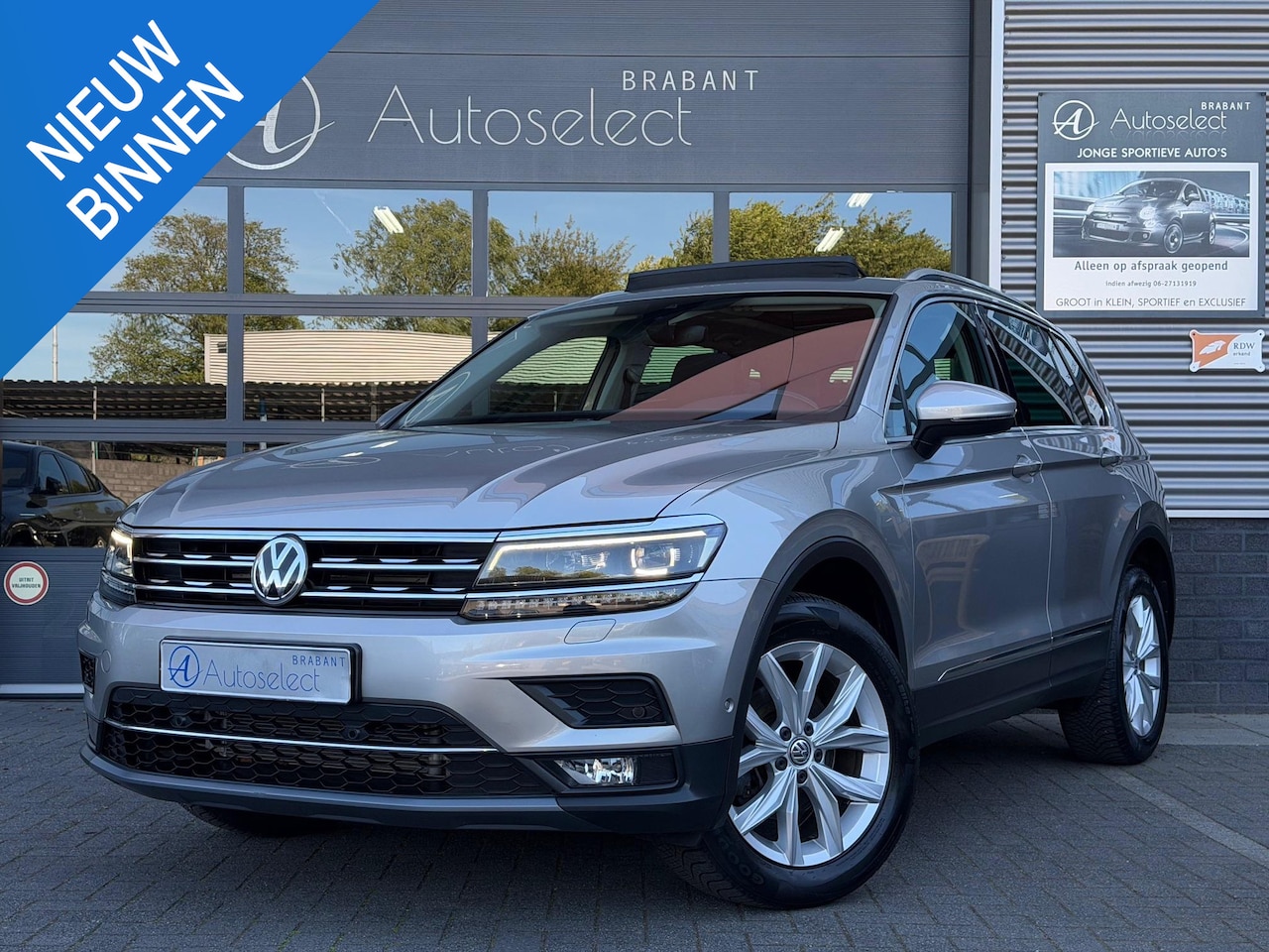 Volkswagen Tiguan - 1.4 TSI 4Motion Highline Pano Navi Camera - AutoWereld.nl