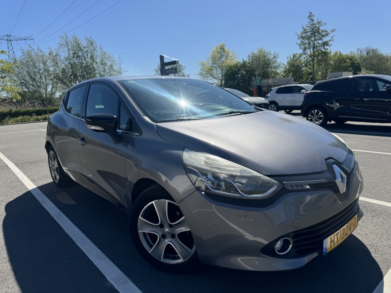 Renault Clio - 1.5 dCi Night&Day Rlink Sensor Navi Airco - AutoWereld.nl