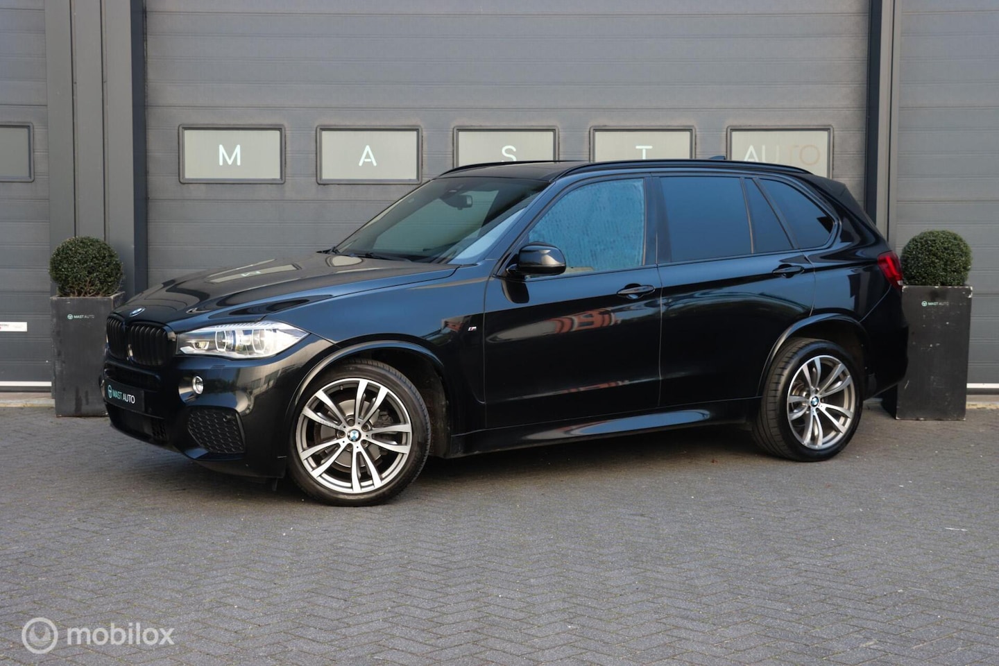 BMW X5 - xDrive30d High Executive|M-Sport|PANO|H&K|Stoelventilatie - AutoWereld.nl