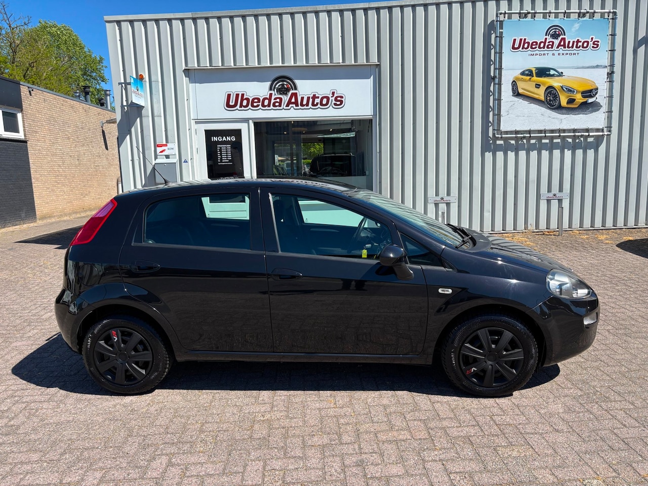 Fiat Punto Evo - 0.9 TwinAir Lounge NL AUTO KM 102003 NAP 5999E - AutoWereld.nl