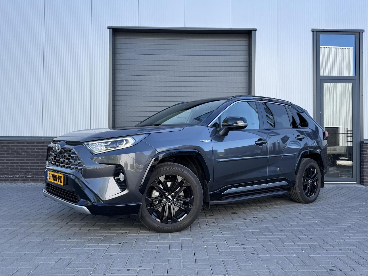 Toyota RAV4 - 2.5 Hybrid AWD Bi-Tone -PANO- JBL- NAP -Trekhaak - AutoWereld.nl