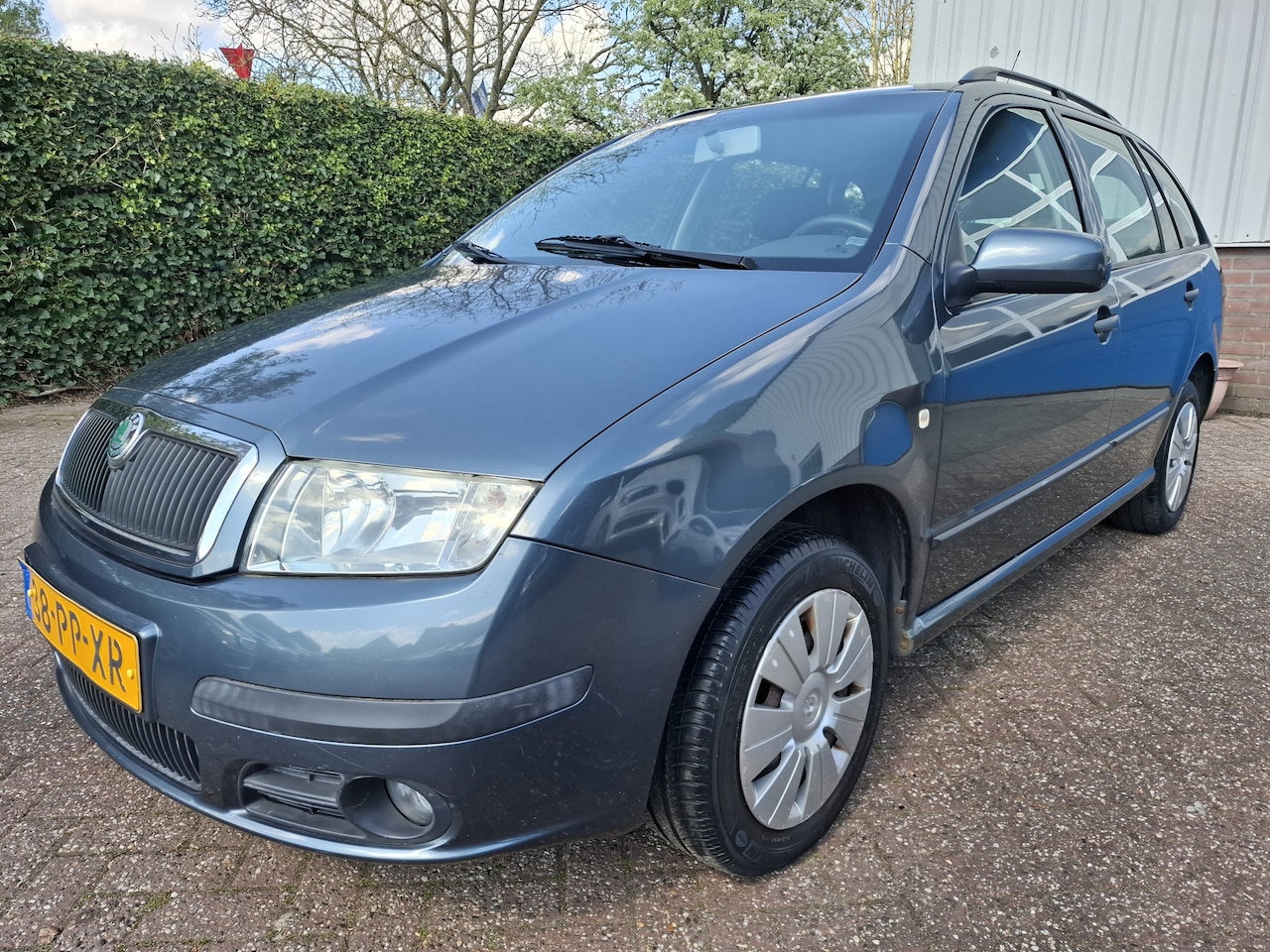 Skoda Fabia Combi - 1.4-16V Elegance AIRCO/CRUISE/TREKHAAK 75PK - AutoWereld.nl