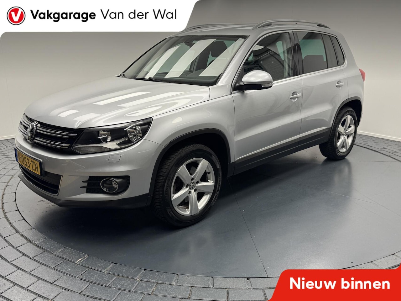 Volkswagen Tiguan - 1.4 TSi Sport&Style Trekhaak-Navigatie-Cr.contr-Clima-Parkeersensoren-Stoelverwarming-Lm17 - AutoWereld.nl