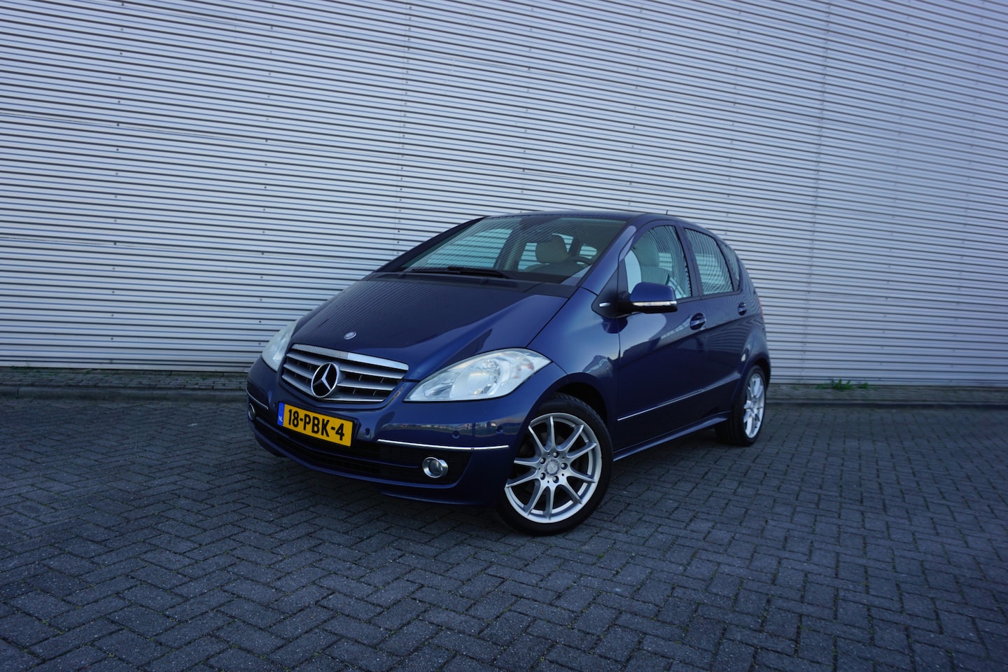 Mercedes-Benz A-klasse - 160 Business Class Elegance AUTOMAAT - Airco / Cruise / BT / Parkeers. / Lm velgen / NAP - AutoWereld.nl