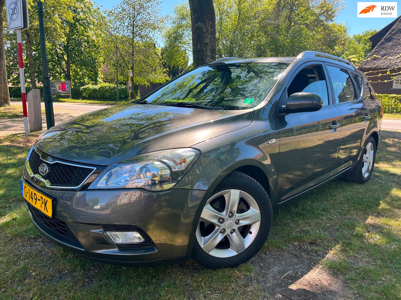 Kia Cee'd Sporty Wagon - 1.4 CVVT X-ecutive Airco / Trekhaak - AutoWereld.nl