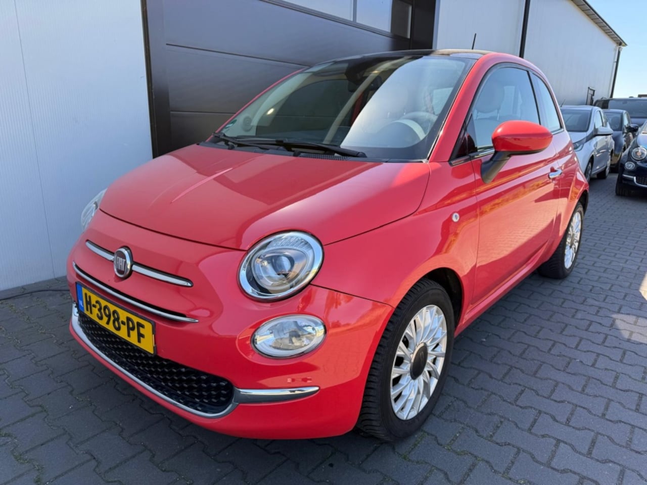 Fiat 500 - 1.2 Lounge | Pano | PDC | Climate | Koraal - AutoWereld.nl