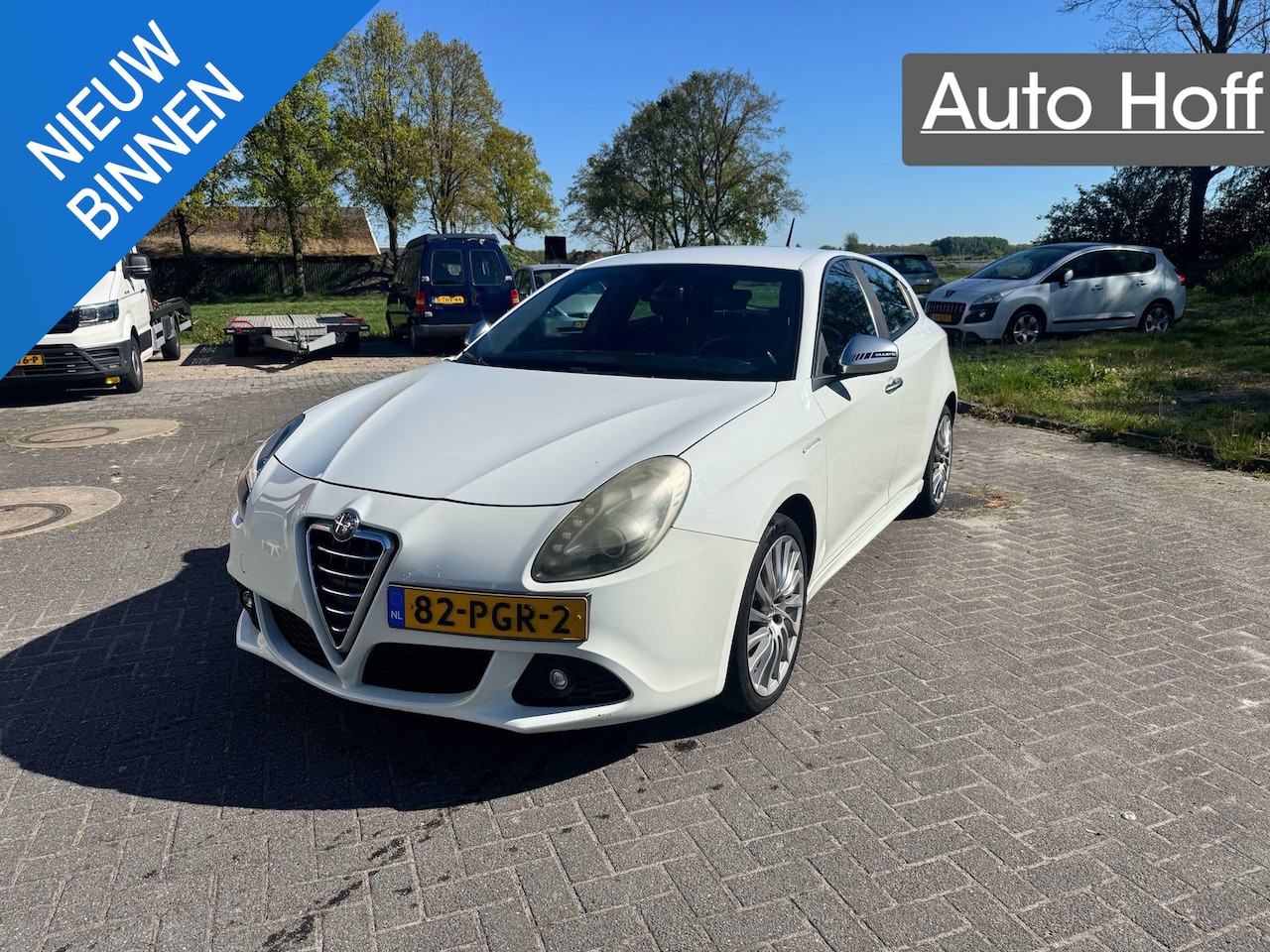 Alfa Romeo Giulietta - 1.4 T Distinctive | Autom. Airco | Cruise Control | 18" LMV | Half Leer | Trekhaak | APK t - AutoWereld.nl