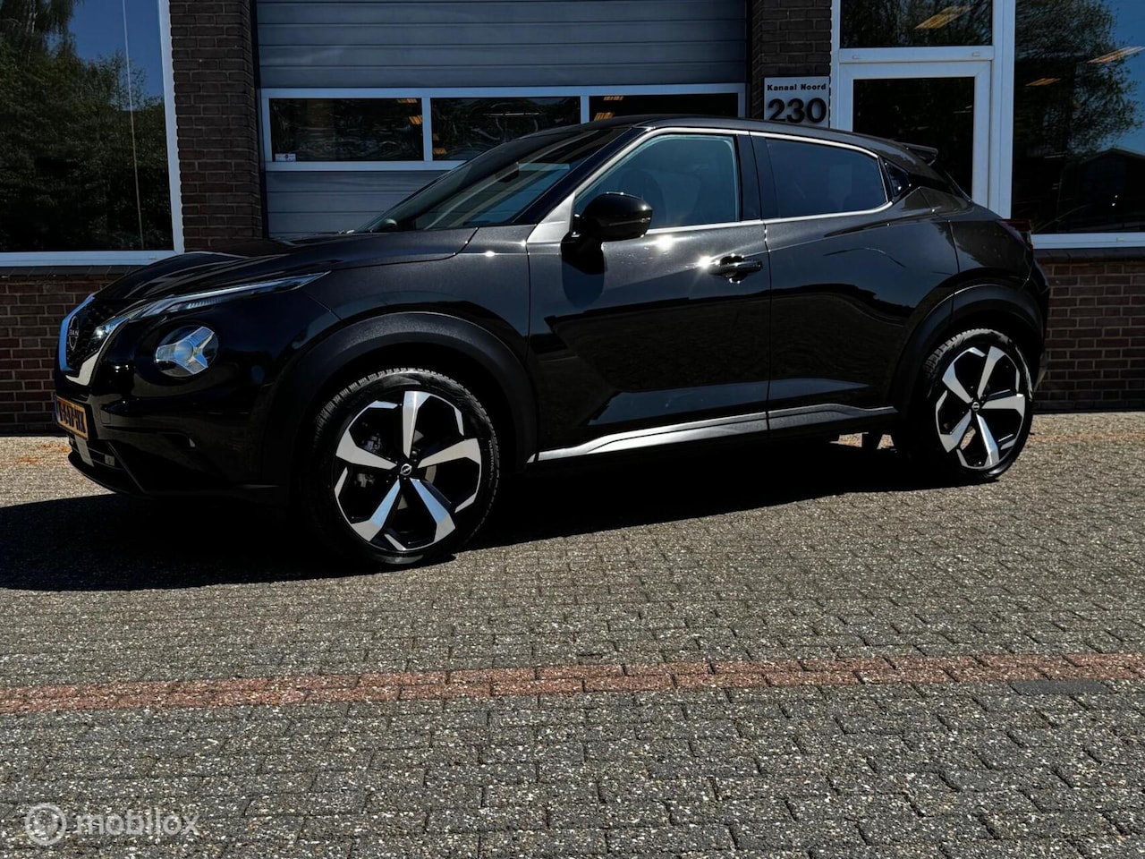 Nissan Juke - 1.0 DIG-T N-Design NAVI/AIRCO/MF-STUUR/XENON - AutoWereld.nl
