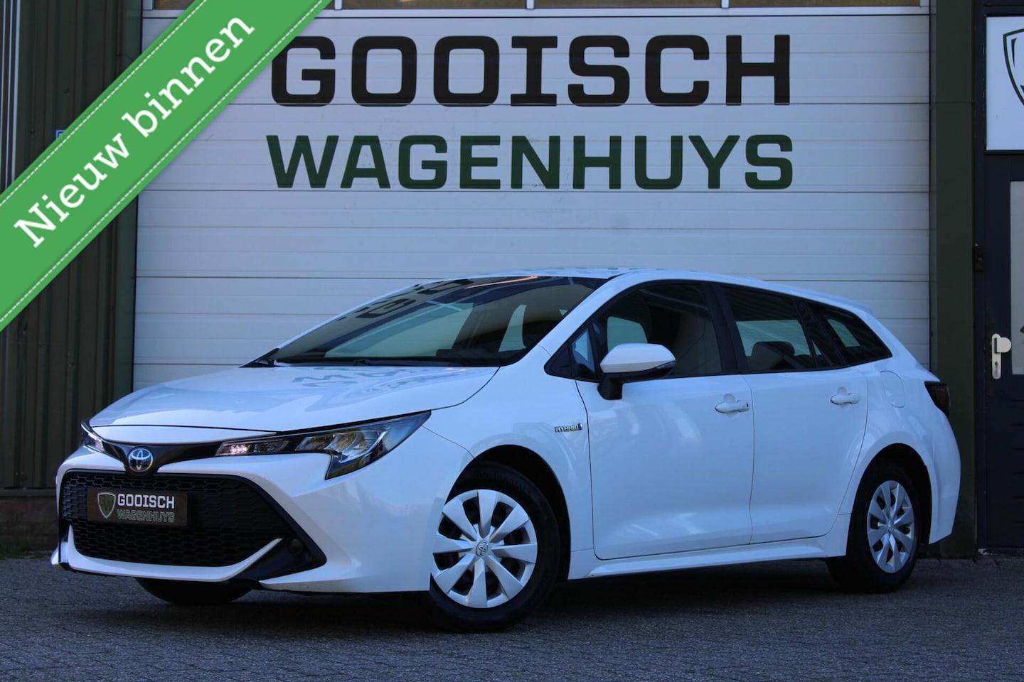 Toyota Corolla Touring Sports - 1.8 Hybrid Comfort | Trekhaak | Camera | Carplay | - AutoWereld.nl
