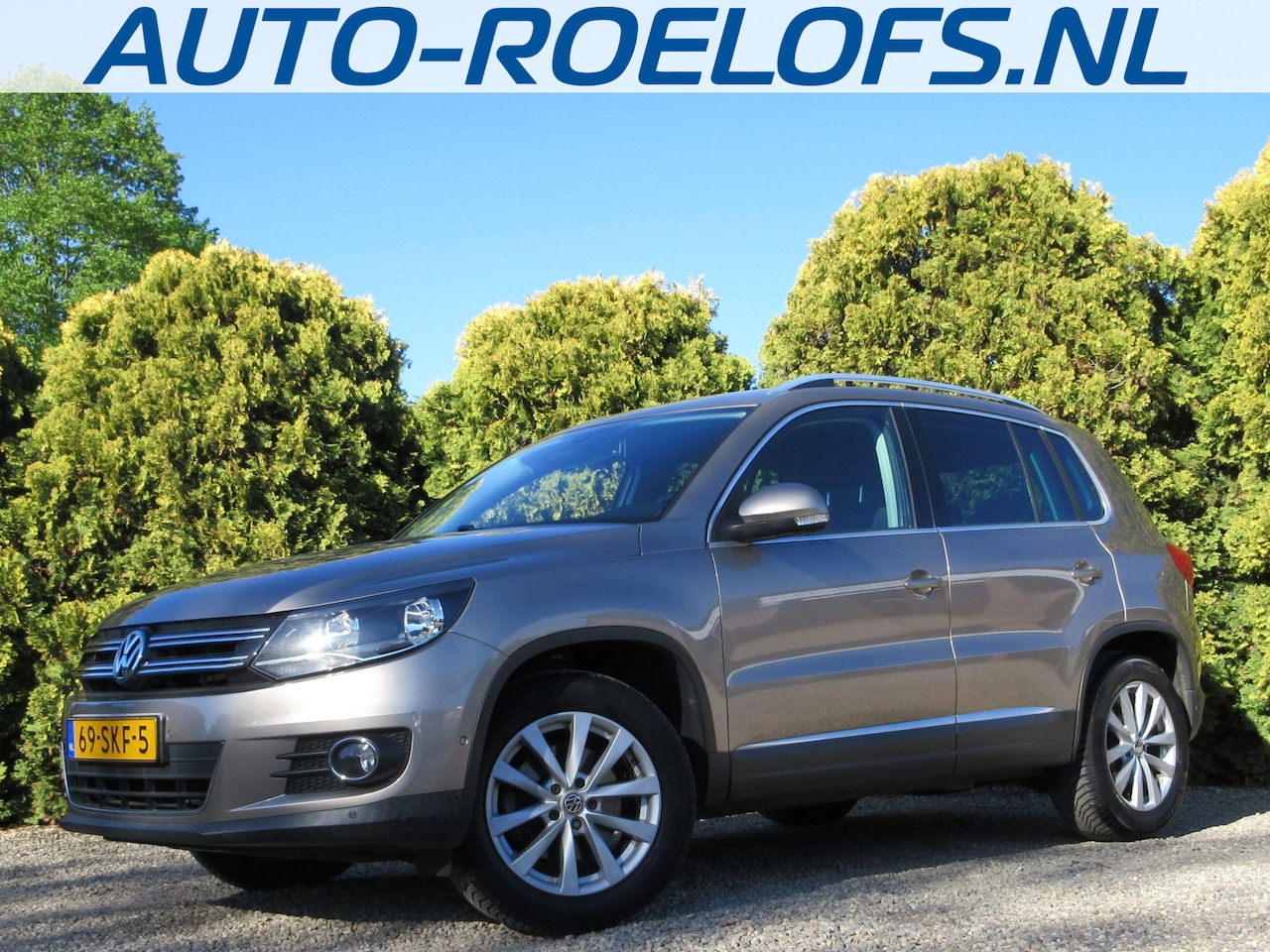 Volkswagen Tiguan - 1.4 TSI Sport&Style *Navi*Trehkhaak* - AutoWereld.nl