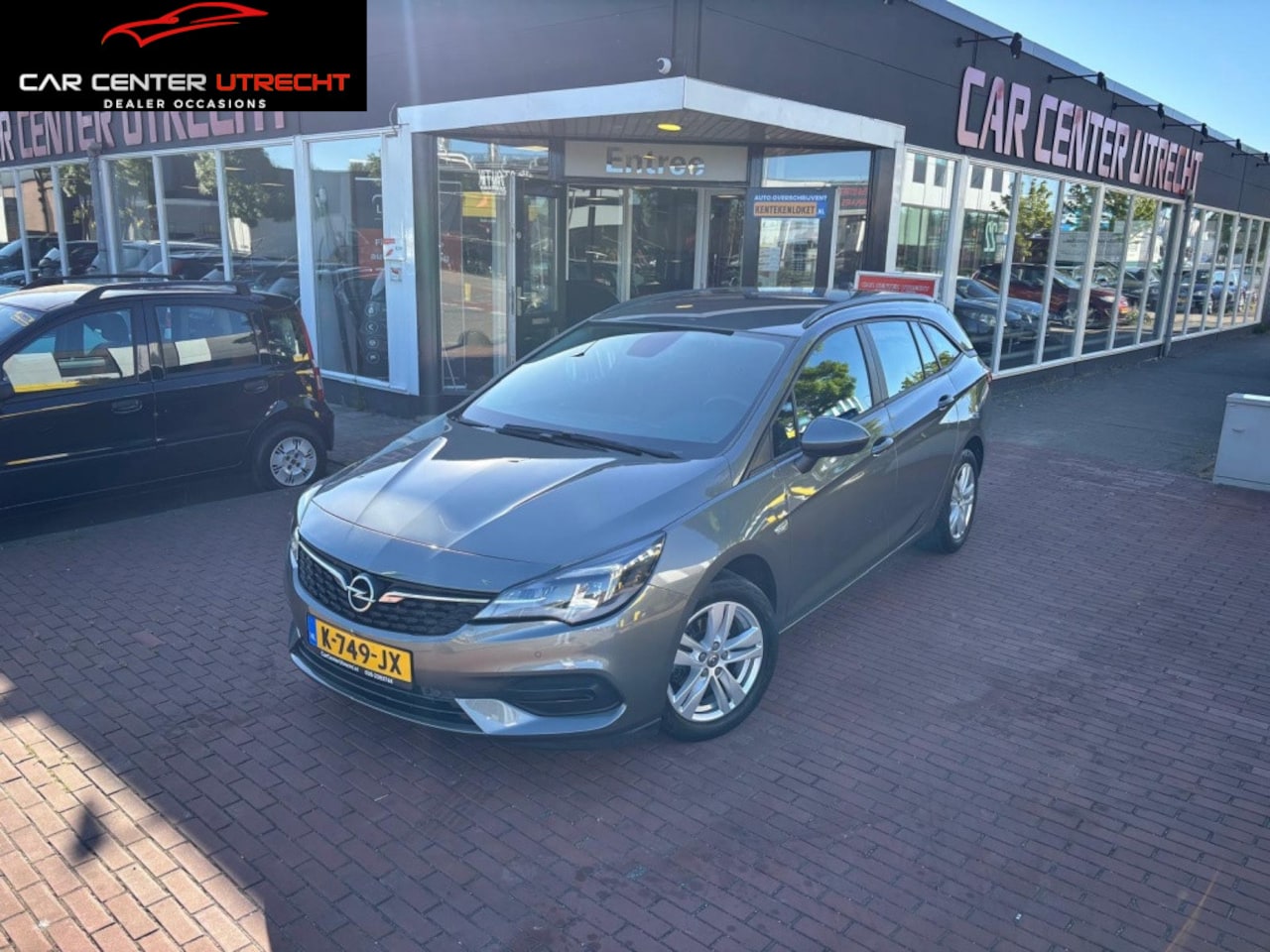 Opel Astra Sports Tourer - 1.2 Edition 6bak navi airco prijs incl btw - AutoWereld.nl