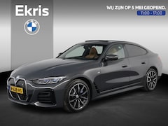 BMW i4 - eDrive40 High Executive 84 kWh Dravitgrau met Cognac Volleder | M Sport | Elektrisch Schui