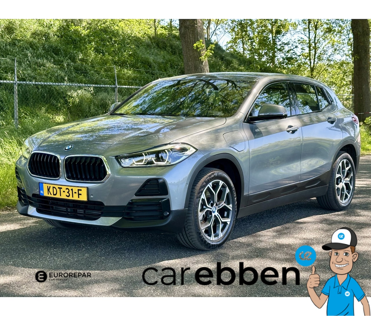 BMW X2 - xDrive25e High Executive | Leder | Sportstoelen | Navi | Connected | Head up | Stoelverwar - AutoWereld.nl