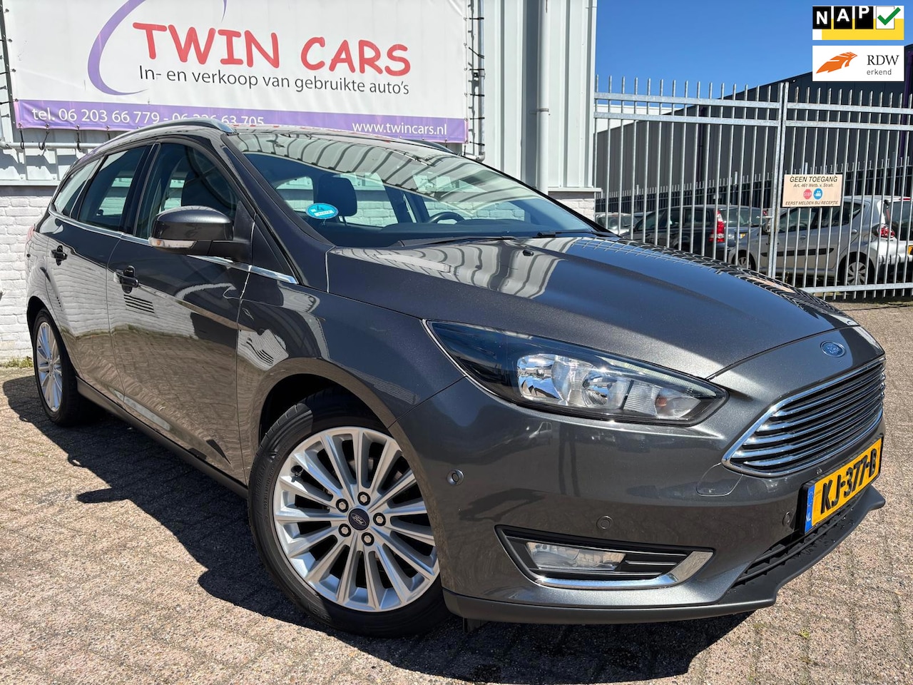 Ford Focus Wagon - 1.0 Titanium AIRCO/NAVI/CRUISE/LMT VELGEN/ELEK. RAAM - AutoWereld.nl