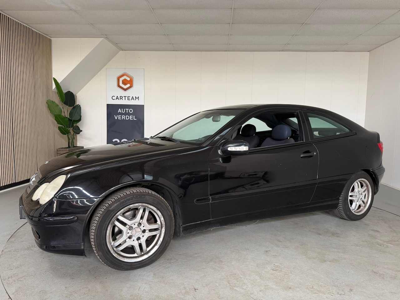 Mercedes-Benz C-klasse Sportcoupé - 180 Airco, Automaat, LMV, Navigatie Inruilauto met APK tot 03-05-2027 - AutoWereld.nl