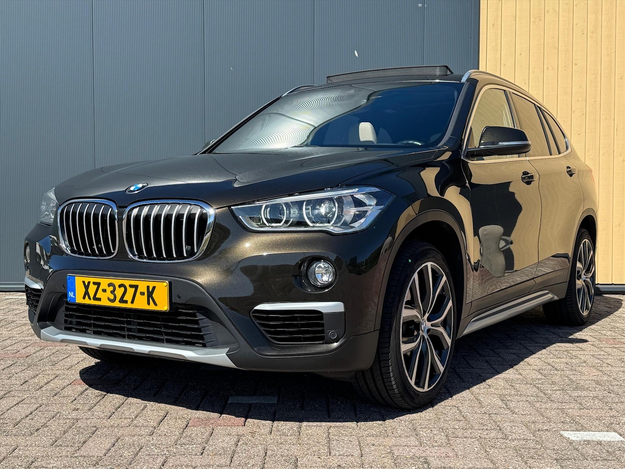 BMW X1 - (f48) sDrive20i 192pk Aut Orange Edition III - AutoWereld.nl