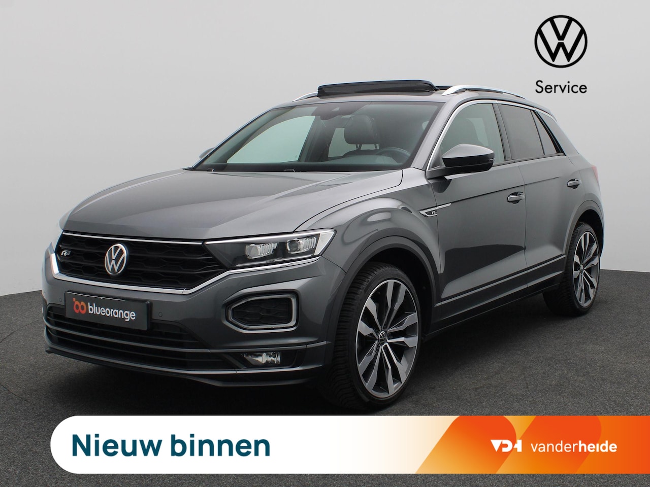 Volkswagen T-Roc - 1.5 TSI Sport Business R 150PK DSG Panoramadak, Trekhaak, Keyless, Side Assist, Stoelverwa - AutoWereld.nl