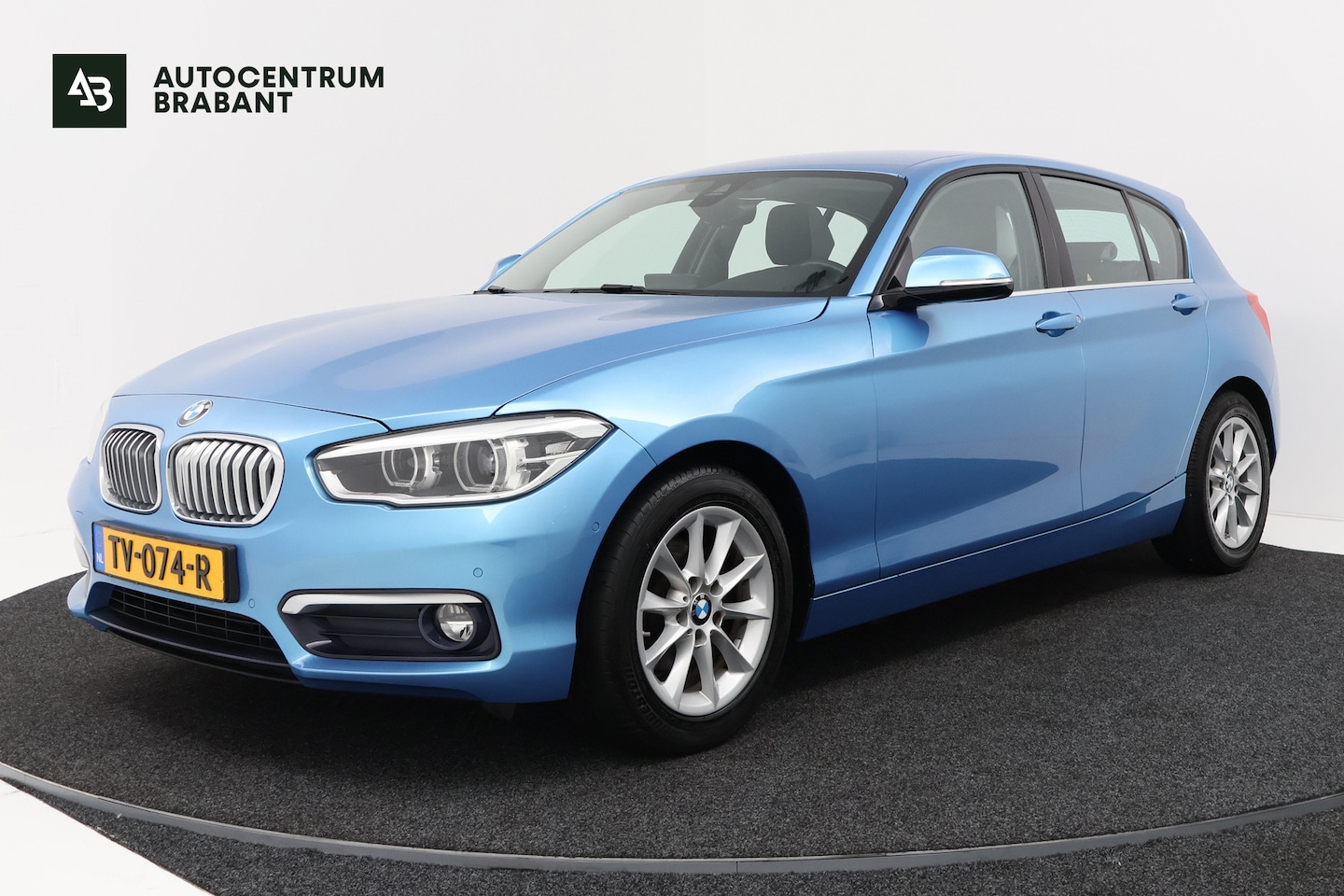 BMW 1-serie - 118i Executive (STOELVERWARMING, CAMERA, NAVIGATIE, CRUISE CONTROL, PARKEERSENSOREN, DEALE - AutoWereld.nl
