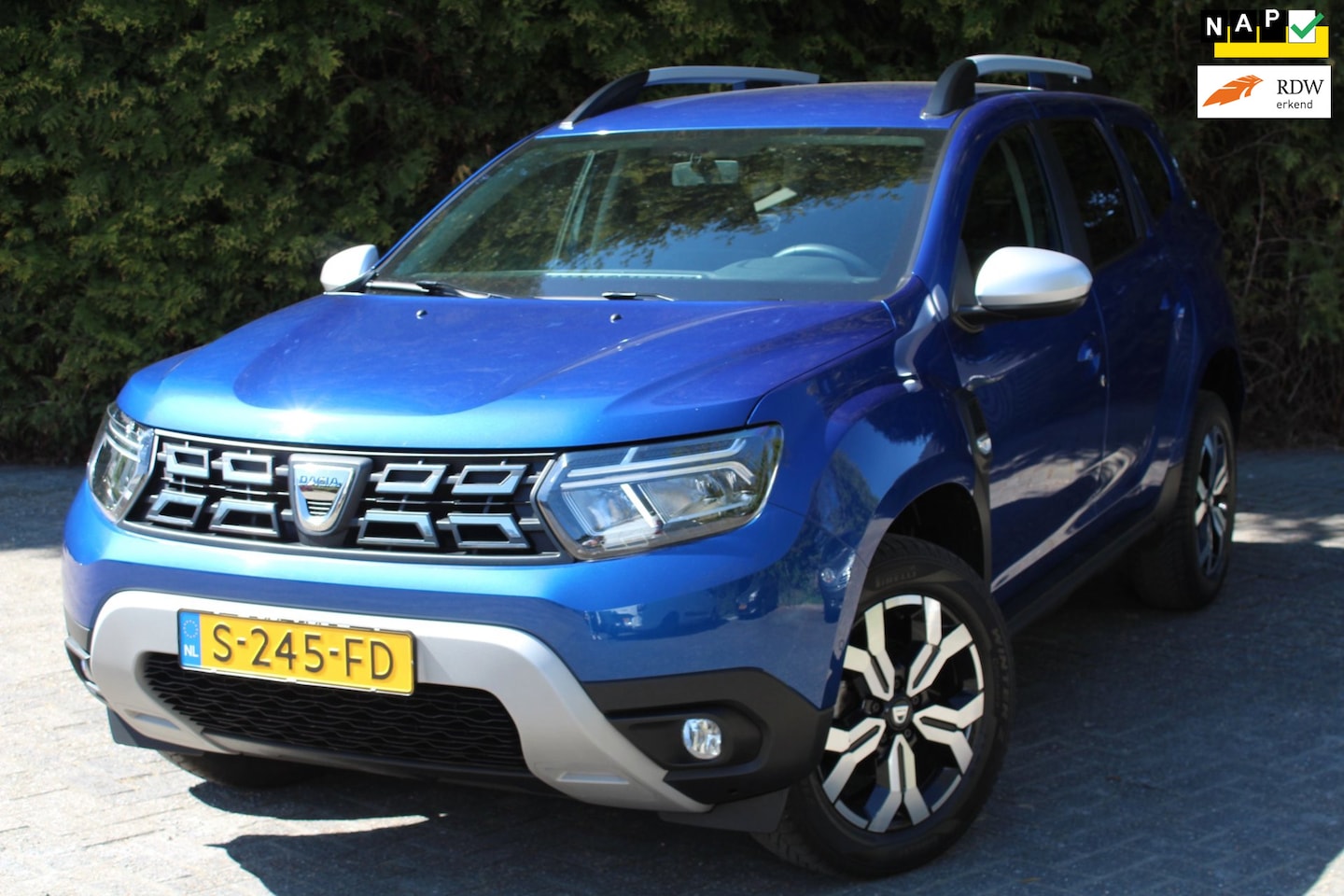 Dacia Duster - 1.3 TCe Prestige 130PK | Parkeercamera | Stoelverwarming | Navigatie | Apple/Android Carpl - AutoWereld.nl