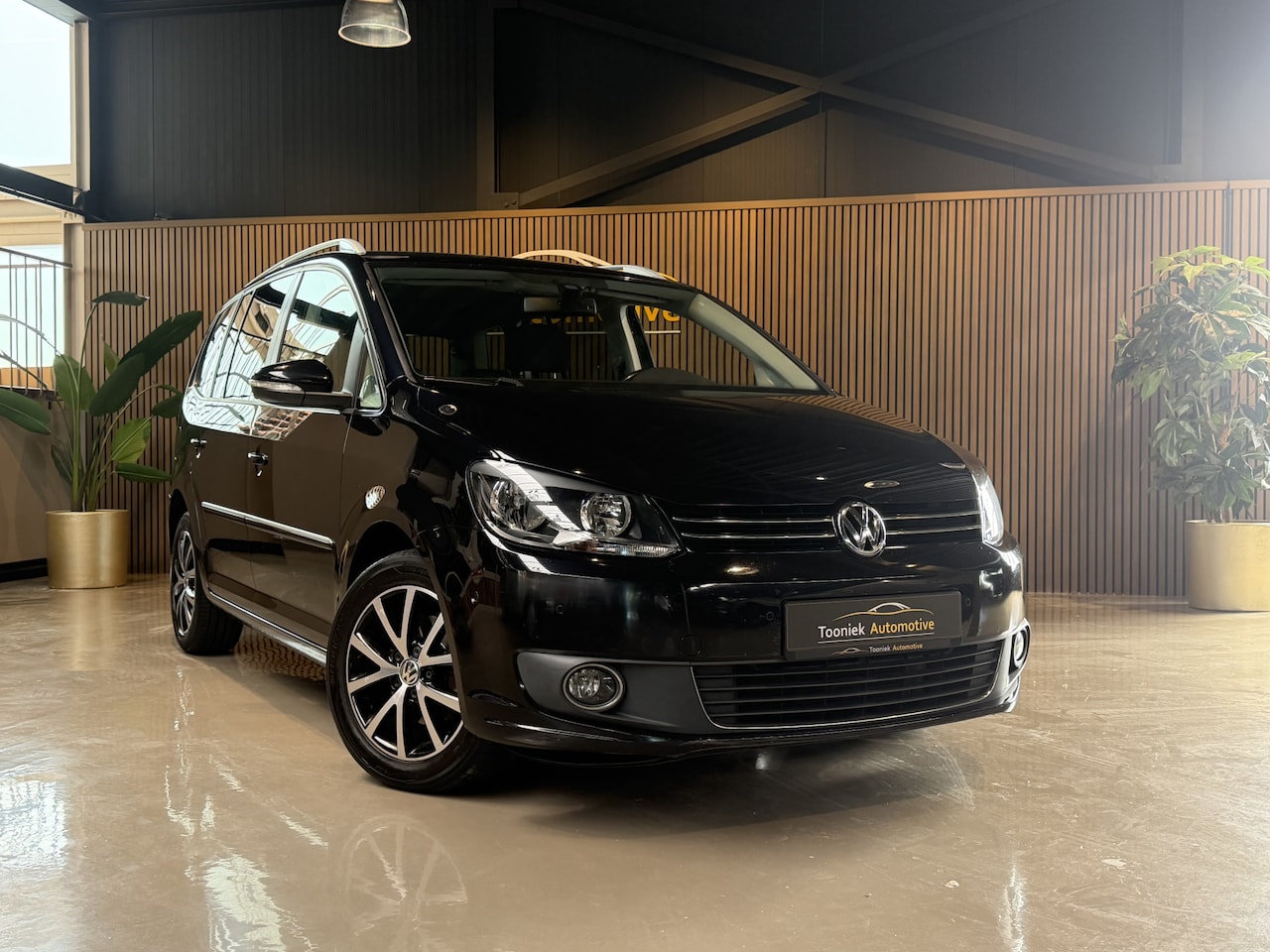 Volkswagen Touran - 1.6 TDI Comfortline BlueMotion 7 persoons navigatie | - AutoWereld.nl