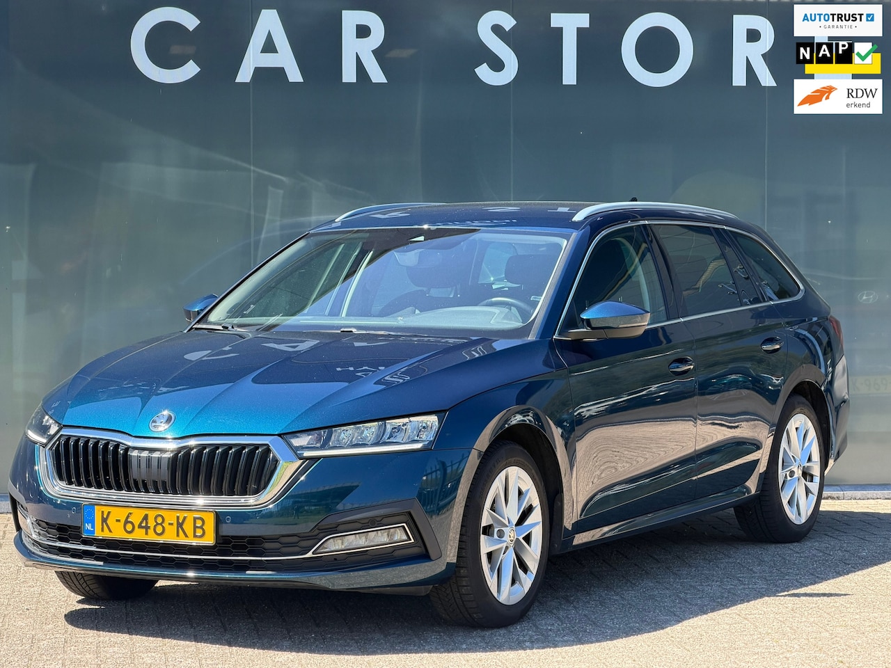 Skoda Octavia Combi - 1.0 e-TSI Business Edition TREKHAAK - AutoWereld.nl