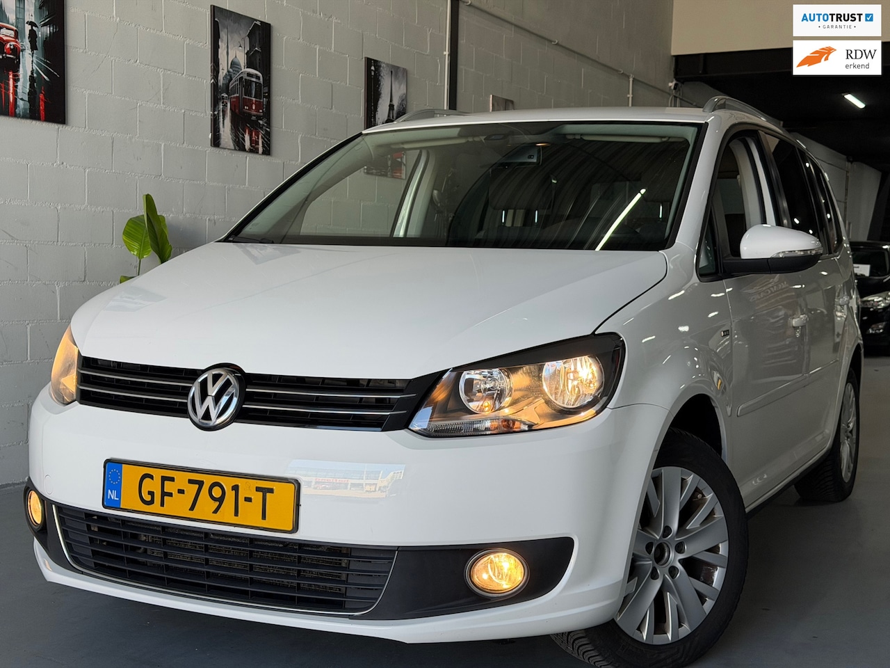 Volkswagen Touran - 1.2 TSI Easyline/ 2e EIG/ dealeronderhouden/ 1jaar apk/ airco/ pdc/ zeer nette auto. - AutoWereld.nl