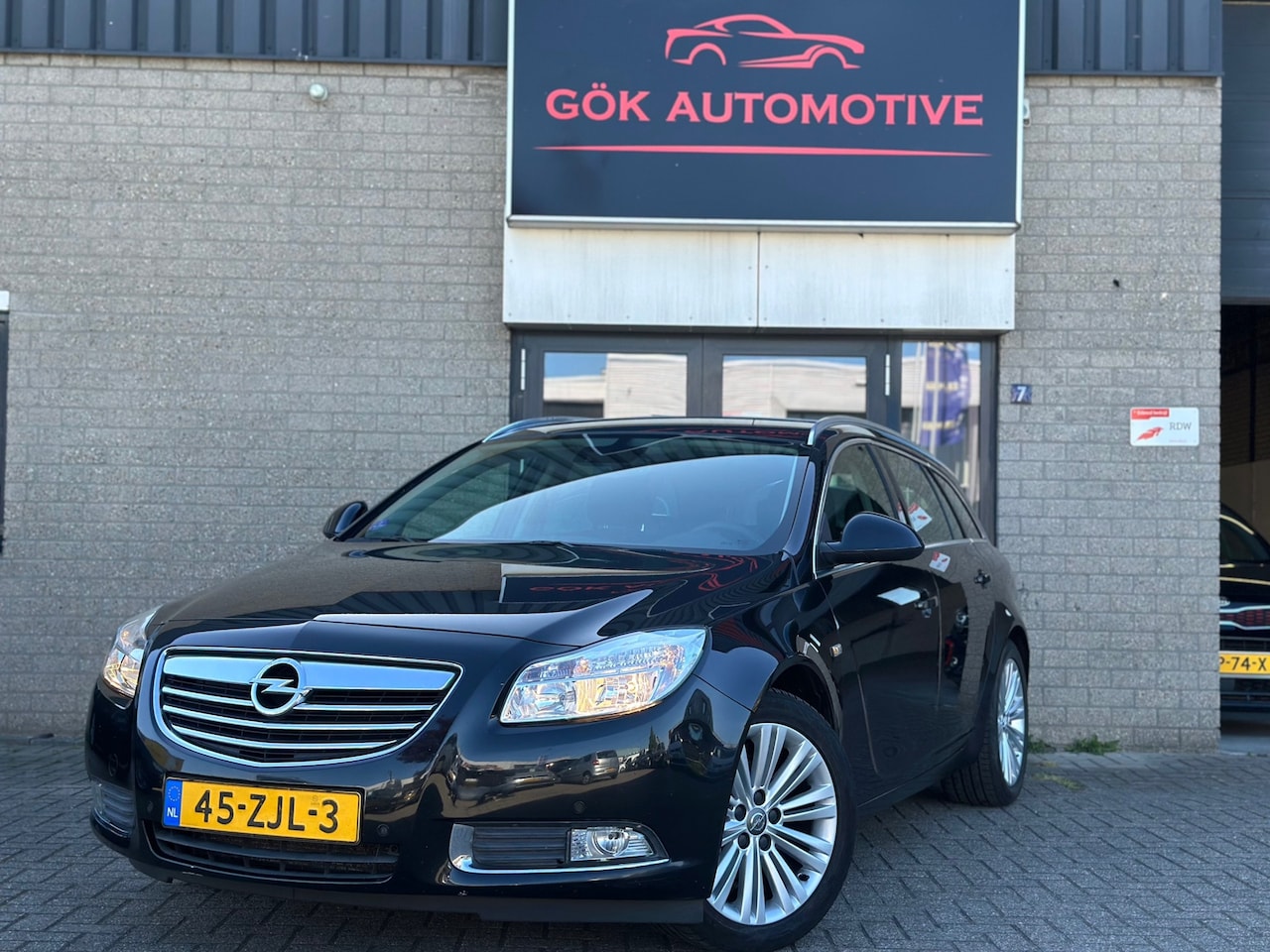 Opel Insignia Sports Tourer - 1.4 Turbo EcoFLEX Business+ / Clima / PDC / NAP / Navi / Cruise Control - AutoWereld.nl