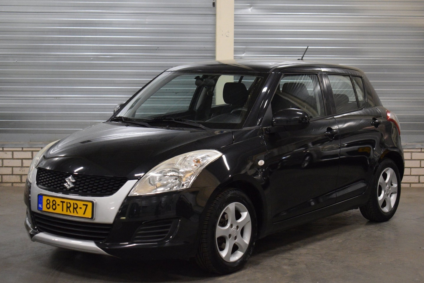 Suzuki Swift - 1.2 Comfort EASSS + Airco|Stoelverwarming|Trekhaak| - AutoWereld.nl