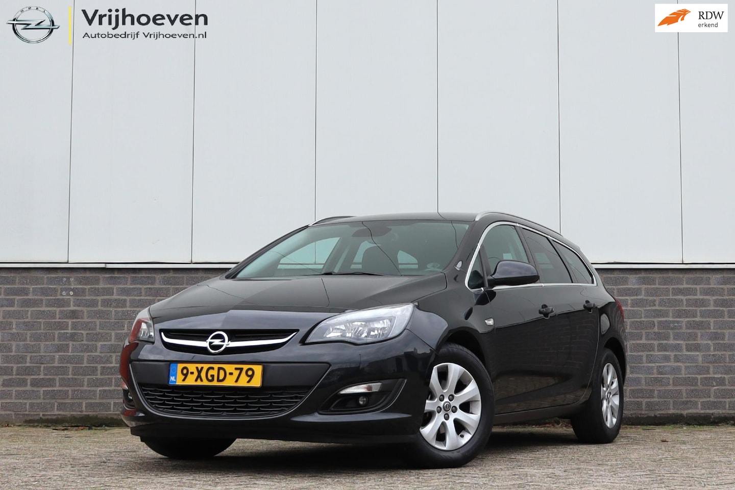 Opel Astra Sports Tourer - 1.4 Turbo Business + Trekhaak - AutoWereld.nl