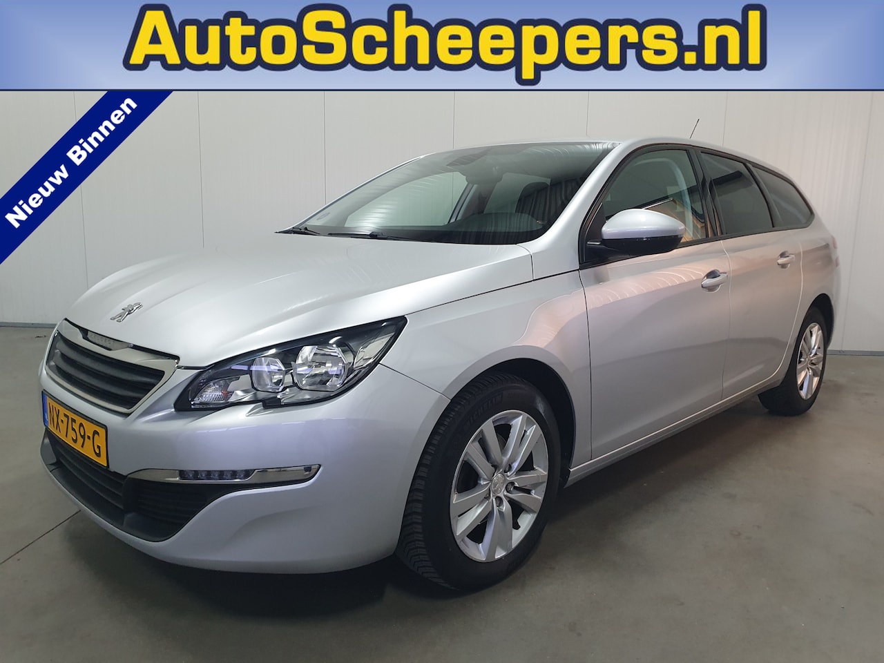 Peugeot 308 SW - 1.2 PureTech Blue Lease Premium NAVI/PDC/CRUISE/TRHAAK - AutoWereld.nl