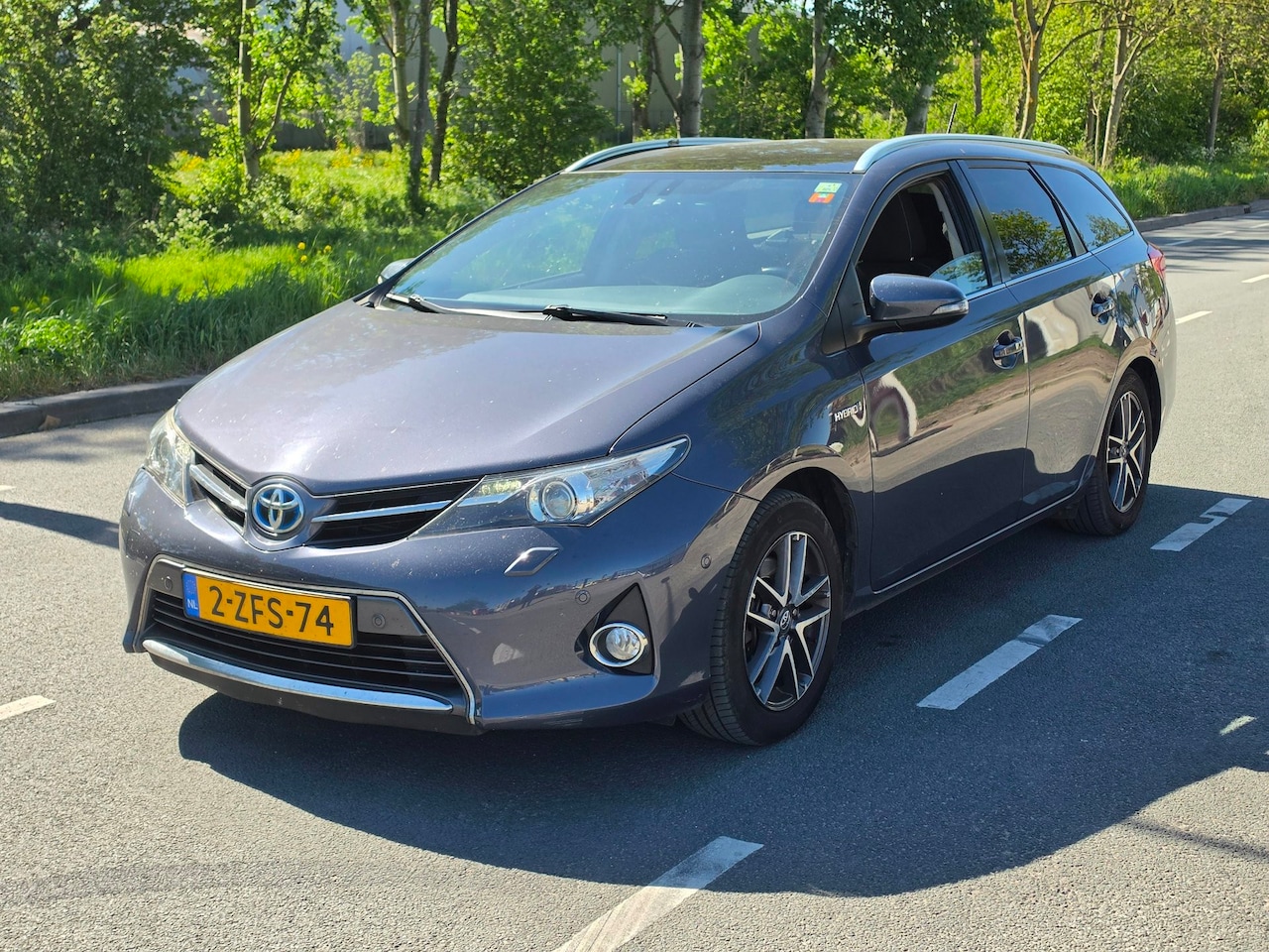 Toyota Auris Touring Sports - 1.8 Hybrid Lease / AIRCO / NAP - AutoWereld.nl