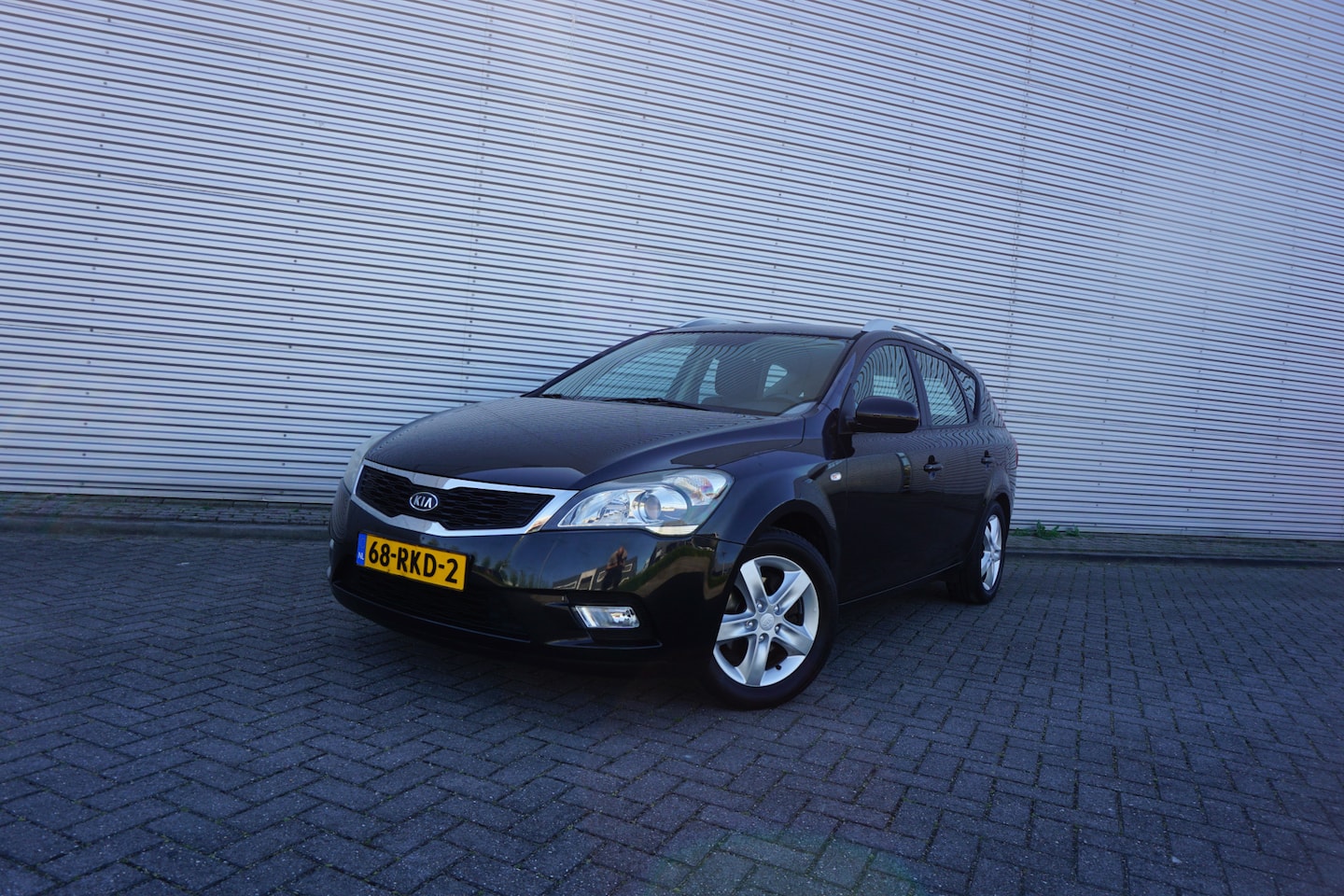 Kia Cee'd Sporty Wagon - 1.4 CVVT X-ecutive Airco / Navi / Cruise / Elektr. ramen / Trekhaak / Lm velgen / NAP - AutoWereld.nl