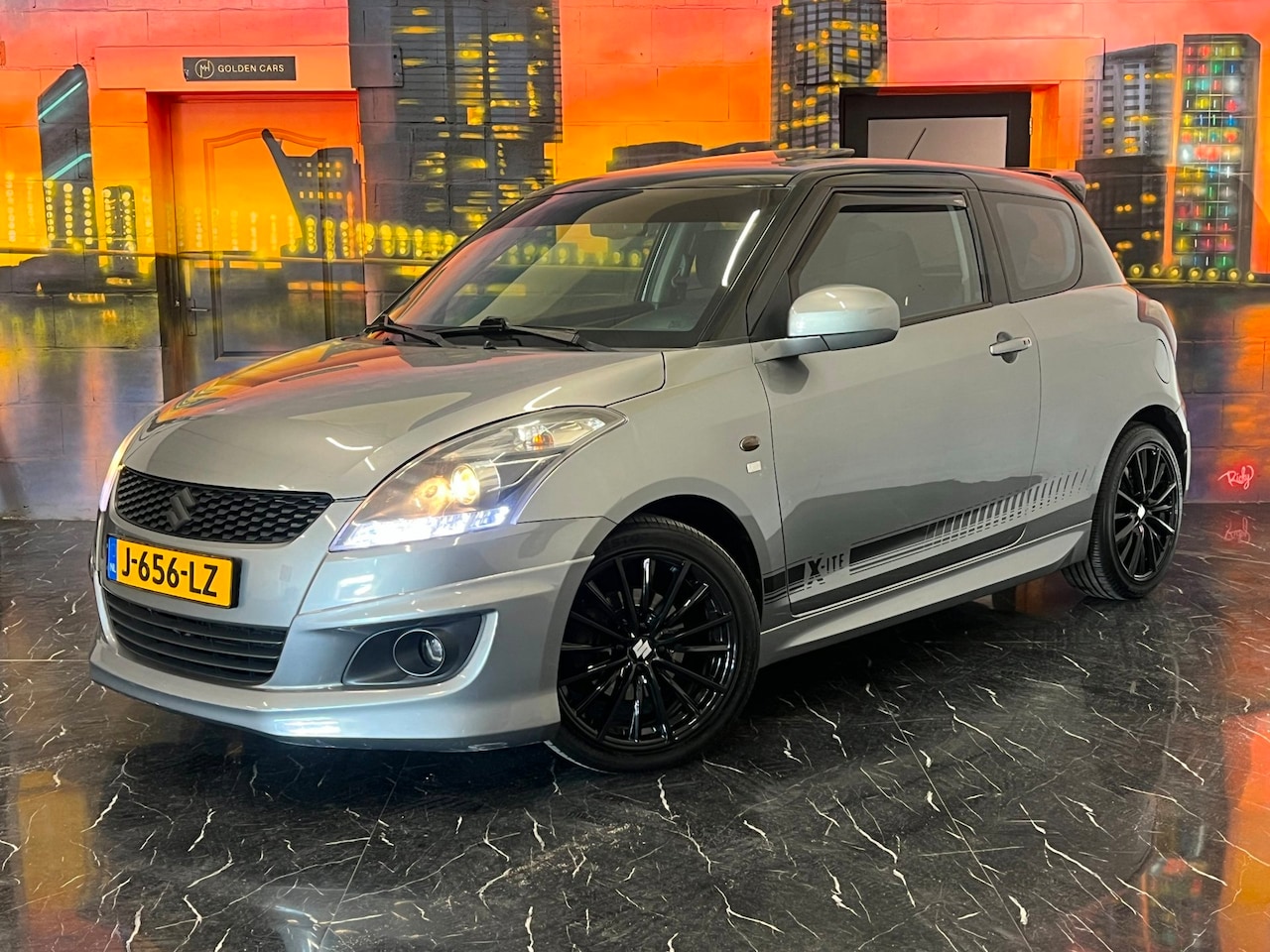 Suzuki Swift - 1.2 Comfort EASSS Pano|Carplay|Stoelverwarming - AutoWereld.nl