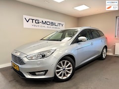 Ford Focus Wagon - 1.5 Titanium Groot Navi|Stuur + Stoelverwarming|PDC V/A|ClimateControl|Keyless Go|Xenon|AP