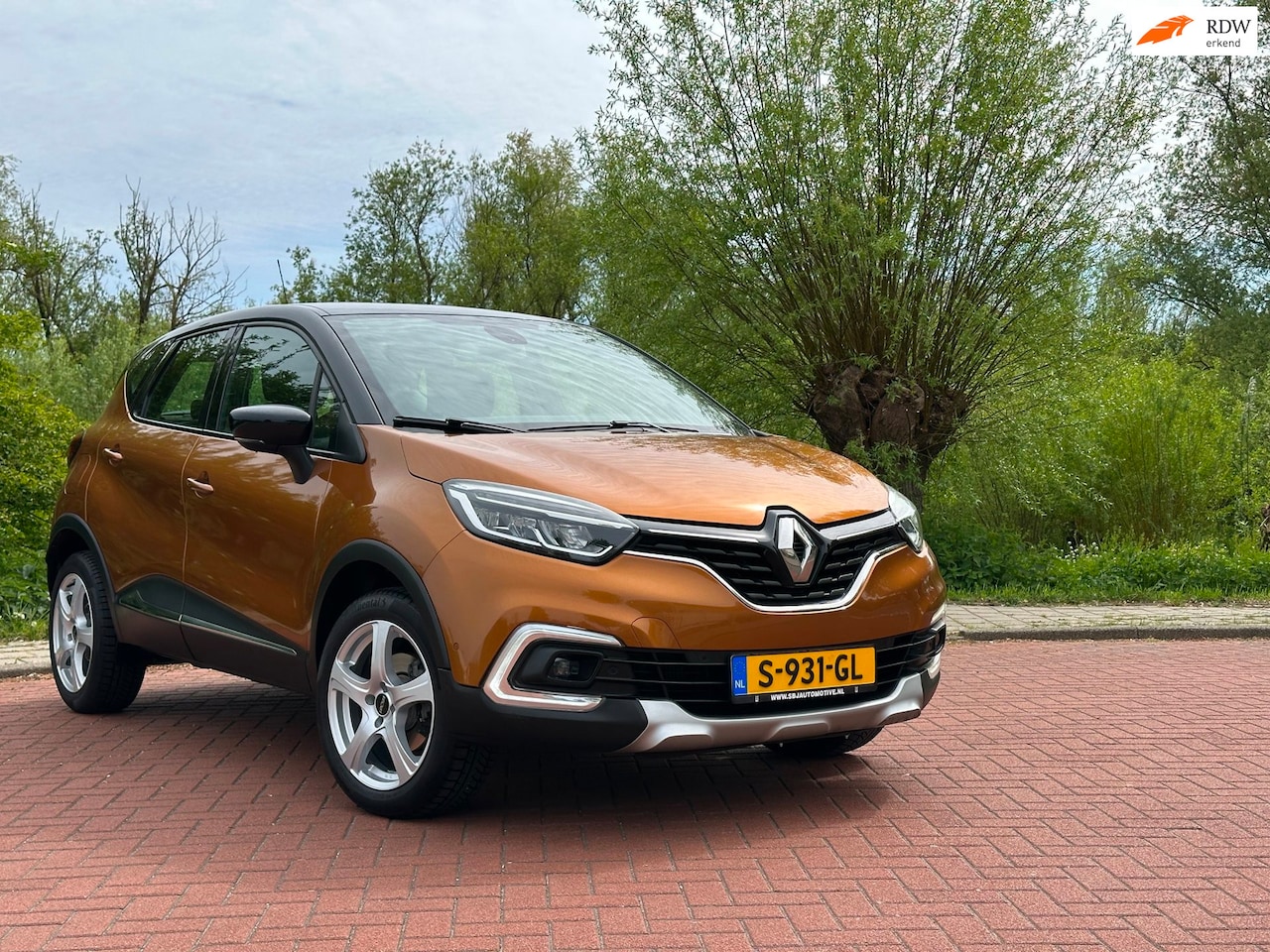 Renault Captur - 1.2 TCe Intens Leer/Cam/ Two-Tone - AutoWereld.nl
