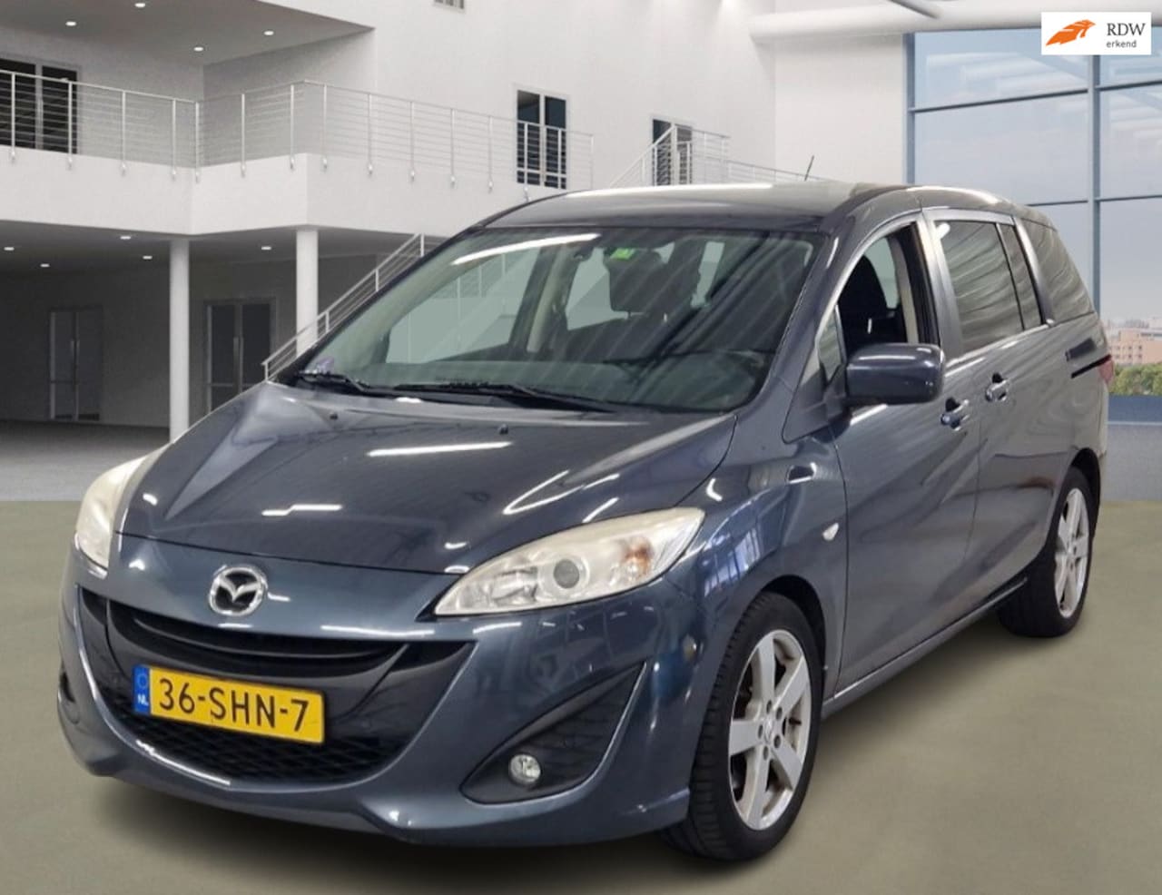 Mazda 5 - 2.0 Business 7p. NAVI PSENSOR CRUISE TREKHAAK 2 X SLEUTELS - AutoWereld.nl