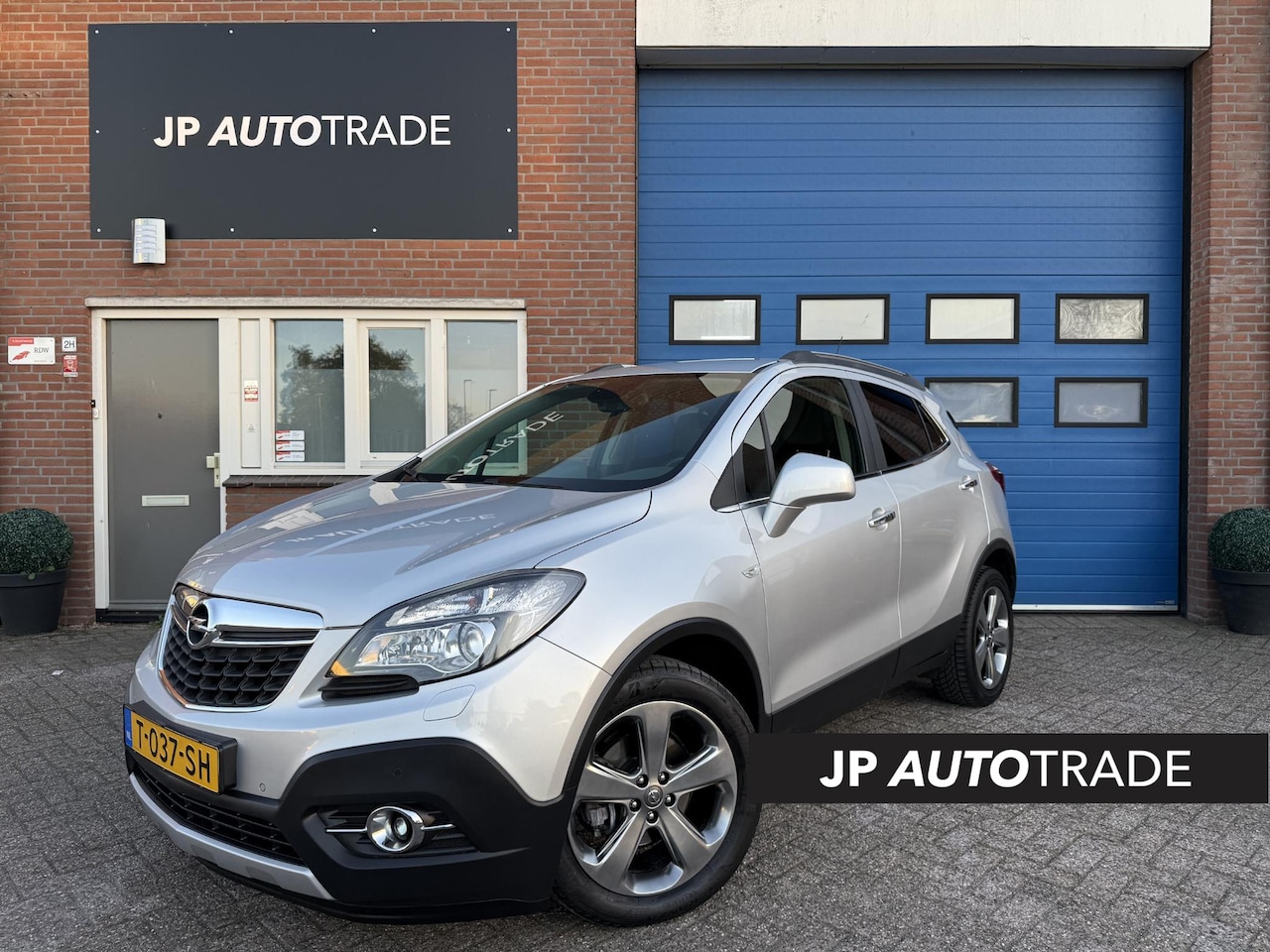 Opel Mokka - 1.4 T Cosmo 4x4 | Stoelverwarming | Nav | Leer | Led | - AutoWereld.nl