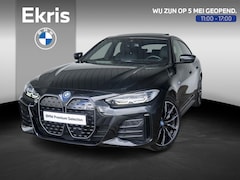 BMW i4 - eDrive40 | M Sport | Stoelverwarming | Schuif-/kanteldak | Active Cruise Control | Parking