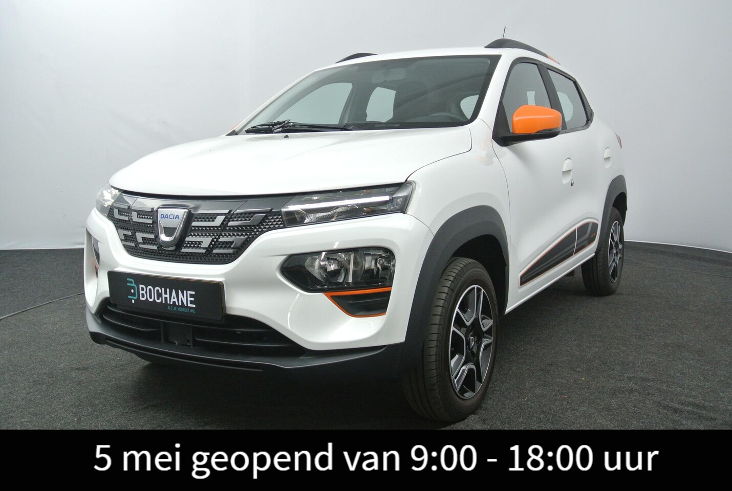 Dacia Spring - Comfort Plus 27 kWh | DC Lader | Orange Pack | Navigatie | Camera | - AutoWereld.nl